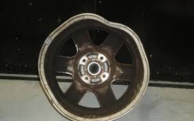 Place your hand on the wheel and turn gently until you notice where the deformed rim touches the brake pad. We Straighten Bent Rims By Rimguard Rim Repair In Raleigh Nc Alignable