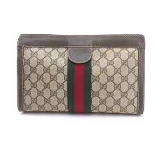 gucci vintage gucci monogram ribbon clutch bag malleries