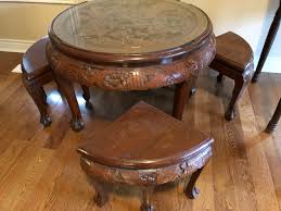 Asian lanka marketing (pvt) ltd. Round Asian Coffee Table With Wedge Shaped Stools