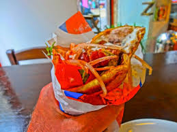 Everyone who has visited the country has tasted at least once the famous souvlaki or. Souvlakia The Hamburger Of Greece