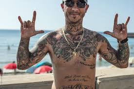 My new womb tattoo just arrived today! Tattooed Man With A Gold Chain On The Sicily Coast Cefalu By Igor Madjinca