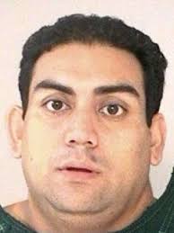 State auditor charged with bribery