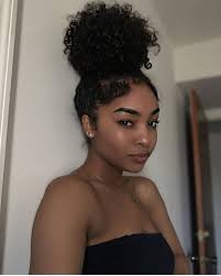 A bun can be secured with a hair tie, barrette, bobby pins, one or more hair sticks, a hairnet. Pin Sabrinaashlyn Natural Hair Styles Hair Styles Curly Hair Styles Naturally