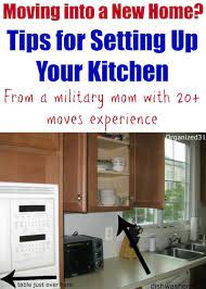 Moving Into A New Home How To Set Up Your Kitchen Organized 31 Moving House Tips Moving Organisation New Homes