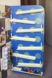 The Ball Ramp Board This Was Definitely My Pride And Joy Inspired By The Stupidly Expensive Vilac House Of B Sensory Wall Infant Activities Toddler Activities