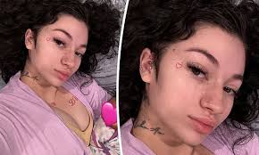 Bhad Bhabie, 20, shares FIRST photo of baby girl Kali Love as she sweetly  cradles the newborn... one week after giving birth