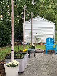 Maybe you would like to learn more about one of these? Diy String Light Planter Posts Momhomeguide Com