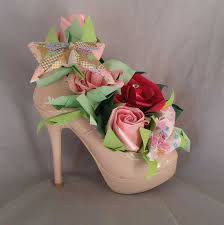 Artificial new stiletto shoe design with multicolor roses that last forever and smell amazing with gorgeous marble vase and box € 100,00 με φ.π.α Stiletto High Heel Shoe Flower Arrangement Red And Pink Origami Roses Washi Paper Origami Butterfly Birthday Or A Floral Shoes Decorated Shoes Flower Shoes