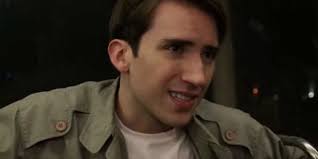 Resident Alien's Extraterrestrial Expert Explained: Who Is Peter "The Alien  Tracker" Bach?