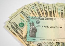 Another Round Of Stimulus Checks Could Be Headed Our Way Here Is What We Know How To Get Money Buying Groceries Buy Hats
