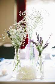 Baby S Breath And Lavender In Bud Vases Centerpieces Will Melissa Photo By Brooke Bud Vase Centerpiece Babys Breath Centerpiece Wedding Lavender Centerpieces