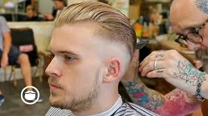 Top faded slick back hairstyles. Slicked Back Skin Fade Haircut Youtube