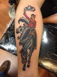 Traditional Cowboy Tattoo | Cowboy tattoos, Flower wrist tattoos,  Traditional tattoo art