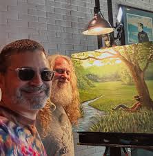 Dear friend and guitar tone guru Michael Wald hanging with Jason Scheuner  and Phil's Mission Control Rick Turner Guitars bass. Dig the Raising The  Dead shirt maestro!