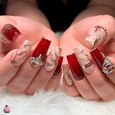 Black Red And White Marble Nails Nail And Manicure Trends This marble nail idea would be perfect for someone with a glamorous and street savvy sense of the classic white, grey, and black marble nail design stand out vividly against the other, darker nails.