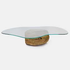 It is perfect for those who like the touch of industrial designs in their home. Organic Shape Glass Top Unique Mango Ball Coffee Table Rotsen Furniture