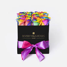 Hand delivered flowers created by professional local florists, delivered on your behalf. Rainbow Rose Box Buy Rainbow Roses Online Rainbow Flowers Delivery