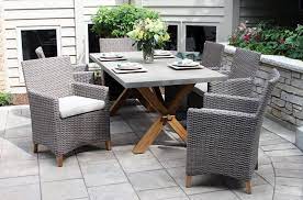 The set comes complete with a simple square dining table and four dining chairs that sport a horizontal splat and sophisticated sloped backs. Choosing The Best Patio Dining Set Outdoor Dining Set Ideas Buying Guide Hayneedle