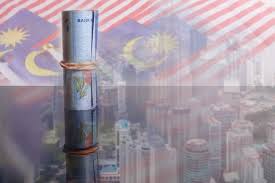 The drop of oil prices, the rise in us rates, and 'excessive speculation in the offshore market'. 4 750 Malaysia Currency Stock Photos And Images 123rf