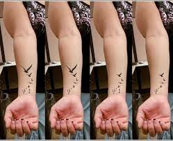21 fantastic dove tattoos on wrist; Bird Tattoo On Wrist