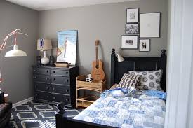 For an older boy, grey walls look great with black furnishings. Minimalist Boy Bedroom Ideas With Dark Grey Wall Paint Decoration Designs Guide