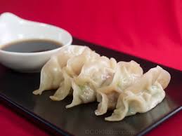 Form into a ball using floured hands and transfer to a bowl. Chinese Pork Dumplings With Soy Ginger Dipping Sauce Recipe Cdkitchen Com