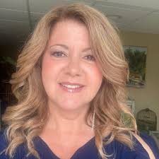 How do I get my Hoya to bloom?