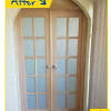 Arched interior glass french doors. 1