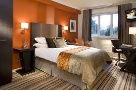 Burnt Orange Kitchen Walls Google Search Bedroom Orange Living Room Orange Red Bedroom Walls