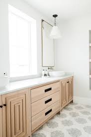 Frame Out The Mirror Trellis Tile Floor Light Wood Vanity Neutral Bathroom Simple Neutral Bathroom Id Bathroom Interior Master Bathroom Bathroom Inspiration
