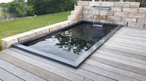 Gfk Teichbecken Mit Wasserfall In Mauer Edelstahl Wasserfall Formalateur Gartenteich In 2020 Water Features In The Garden Backyard Garden Design Pool Landscaping