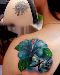 Hibiscus Butterfly Shoulder Blade Cover Up Best Tattoo Ideas Designs Cover Up Tattoos For Women Tattoos For Women Flowers Cover Up Tattoos