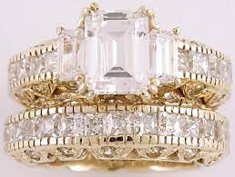 This Magnificent Wedding Set Features A Vintage Style Engagement Ring W Vintage Style Engagement Rings Cubic Zirconia Jewelry Sets Engagement Ring Wedding Band