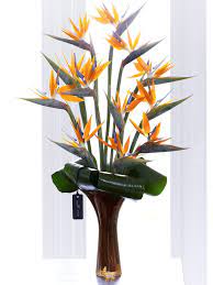 If you require assistance in making your flower selection a professional florist from the. Luxury Strelitzia Arrangement Tropical Flower Arrangements Luxury Flowers Luxury Flower Arrangement
