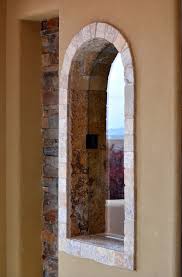 Clay Plaster And Exterior Stone Archtop Shower Window W Stacked Stone Detail Window In Shower Exterior Stone Architecture Details
