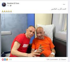 شريف دسوقى, شريف دسوقي نهال عنبر ورئيس المركز الكاثوليكى يزوران شريف دسوقي ويهديانه مصحفا وورودا. ØµÙˆØ±Ø© Ù„Ù€ Ø§Ù„ÙÙ†Ø§Ù† Ø´Ø±ÙŠÙ Ø¯Ø³ÙˆÙ‚Ù‰ Ù…Ù† Ø¯Ø§Ø®Ù„ ØºØ±ÙØªÙ‡ Ø¨Ø¯Ø§Ø± Ø§Ù„Ø´ÙØ§Ø¡ Ø§Ù„ÙŠÙˆÙ… Ø§Ù„Ø³Ø§Ø¨Ø¹