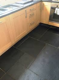 Resolving Installation Issues With A Black Limestone Tiled Floor Black Floor Tiles Black Tiles Kitchen Kitchen Flooring
