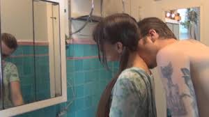 Mobile porn reflection - busty MILF in front of mirror