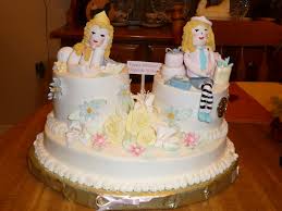 A birthday cake for a set of twins, their mum basically wanted a pink and blue theme and that was it. Twins Birthday Cakes