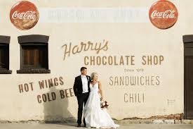Wedding Photographer Captures Bride And Groom At Harry S Chocolate Shop In West Lafayette Indiana Wedding Wedding Portraits Photography