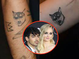 Every good dog loves a ball and every good dog owner who gets a tattoo of said dog includes that there could be no series of dog tattoo pics to talk about with a cartoon chihuahua in a sombrero at a. Celebrities With Tattoos Of Their Pets