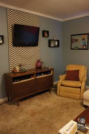 A jungle of cords hanging from the tv will give away a very unattractive look. How To Hide Your Tv Wires Without Cutting Into Your Walls The Plug Hellotech