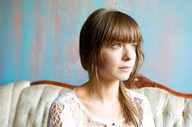 I've been roaming around i was looking down at all i see painted faces fill the places i. Laura Jansen American Songwriter