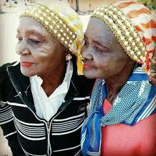 Luo mothers with their Girls: 6-10 yrs- Dhiga skul gi Brian kik iwuoth  kendi nyathina jo kachinja nomaki. 12-15 yrs-Aneno ka adole moko matindo  tindo ochako maki ni Brian gini ema