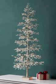 Tree has small green leaves and offers a delicate look with a sturdy design. 22 Perfectly Modern Christmas Trees Contemporary Christmas Ideas