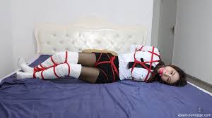 Struggling with a Uniform and Boots Binding | Asian Bondage
