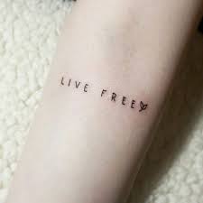 24 Beautiful Little Phrases To Tattoo On Yourself One Word Tattoos Freedom Tattoos Word Tattoos