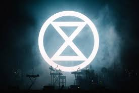 The extinction symbol is a very impactful piece of design. Extinction Rebellion Uses Bold Graphics In Protest Against Climate Change