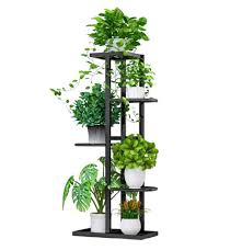 This wrought iron, starburst design is both durable and stylish and is fitting for both indoor and outdoor use. Flower Plant Stand Indoor 5 Tier Metal Plant Stand Flower Pots Stand Holder Planter Display Black Buy Online At Best Price In Uae Amazon Ae