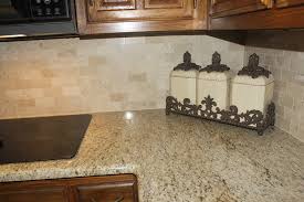 When it comes to choosing the kitchen cabinets colors that are the darker shades of the granite slabs combine very well with soft white, cream and yellow cabinets. Giallo Ornamental Granite Countertop Crema Marfil Backsplash Kitchen Austin By By Design Kitchen And Bath Solutions Houzz